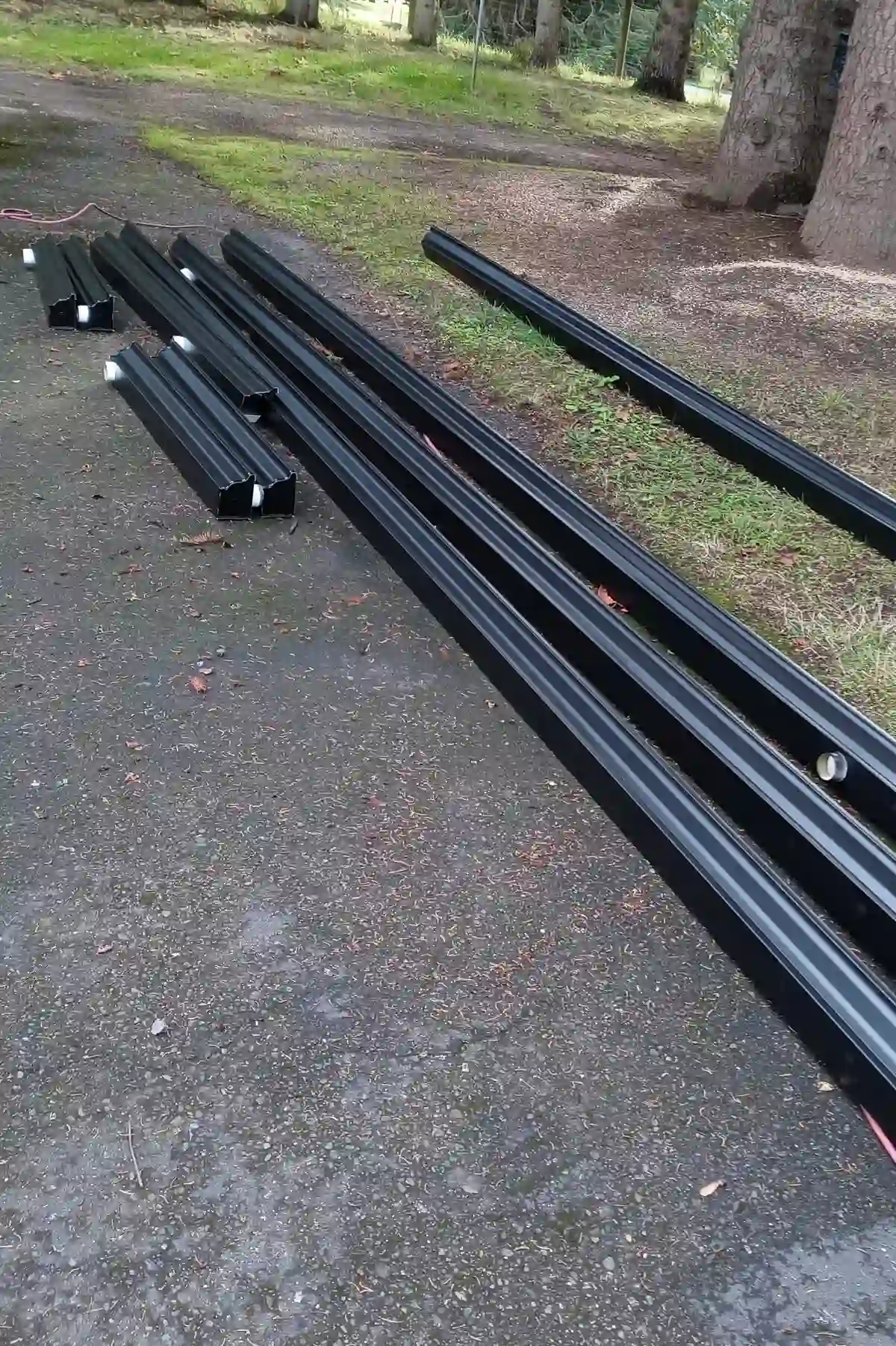 5k black gutters staged for installation.