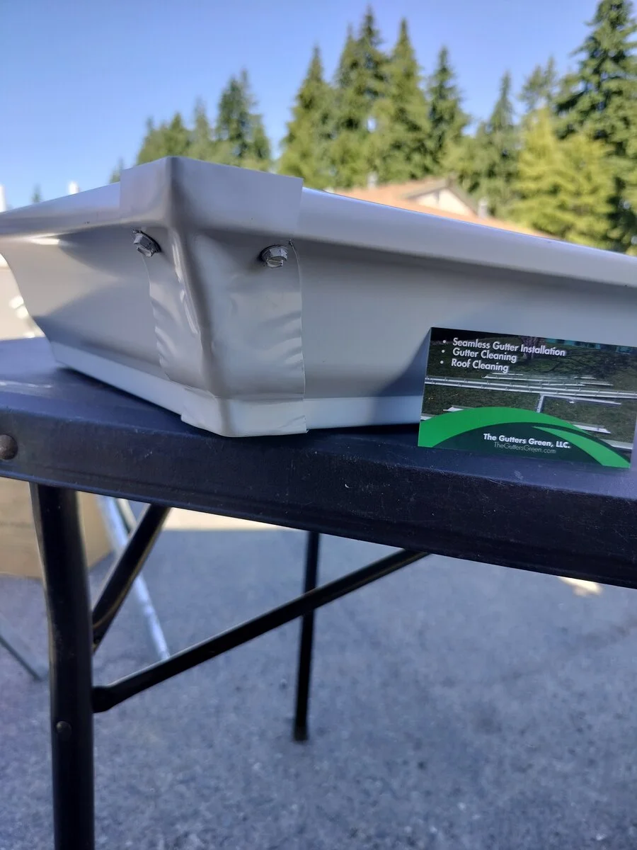a gutter with a strip miter corner